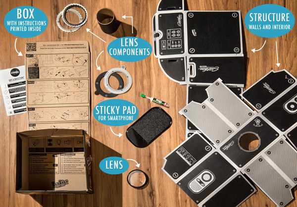 DIY Smartphone Projector components on a table.