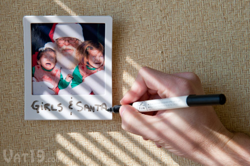 Use dry erase markers to caption your photos.