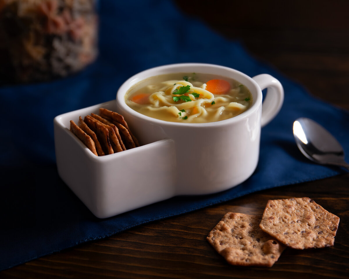 Soup and Cracker Mug conveniently holds your crackers for easy dipping.