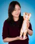 You don't need to hold 'em. These plush cats can stand on their own. 