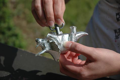 Wind up the walking triceratops using the included plastic key.